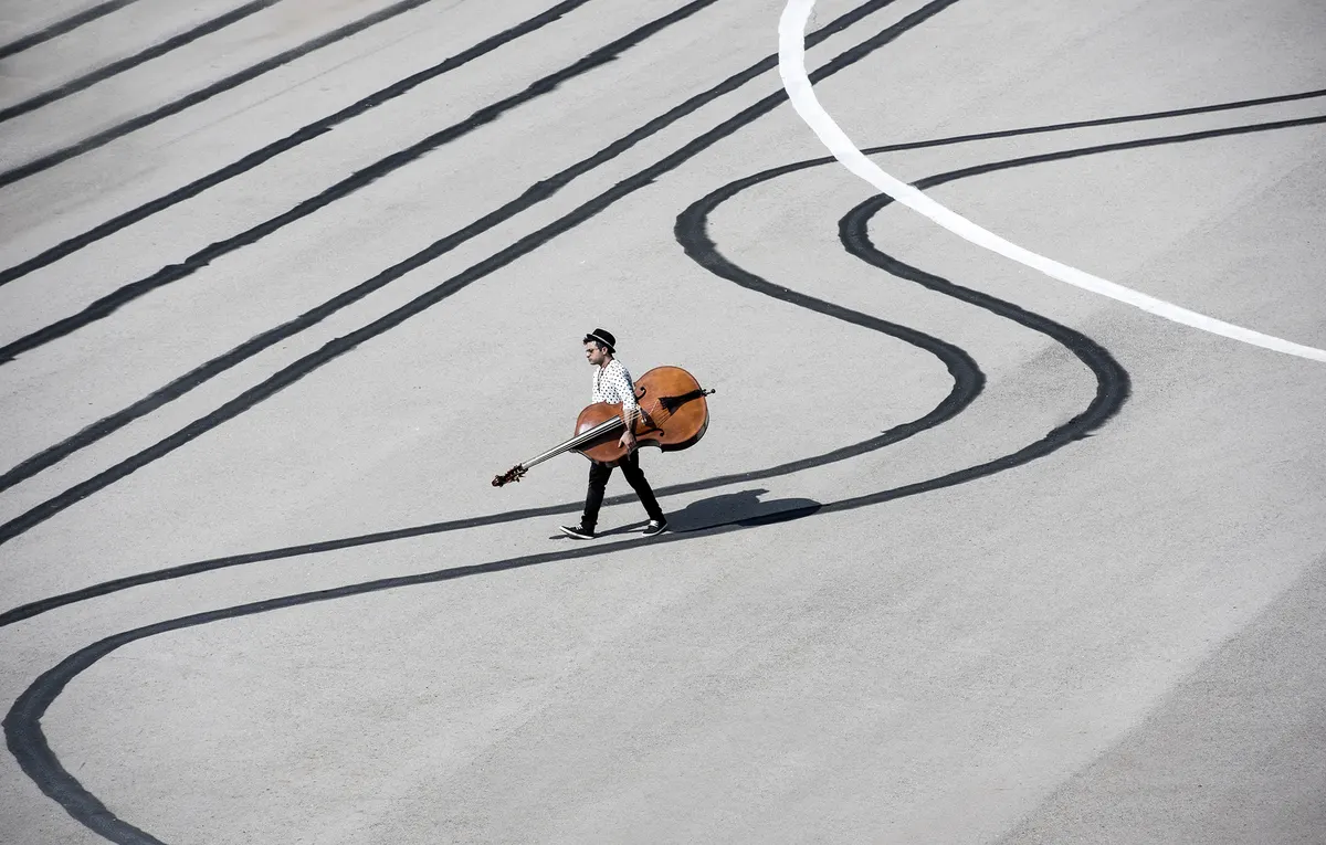 Adam Ben Ezra portrait with double bass