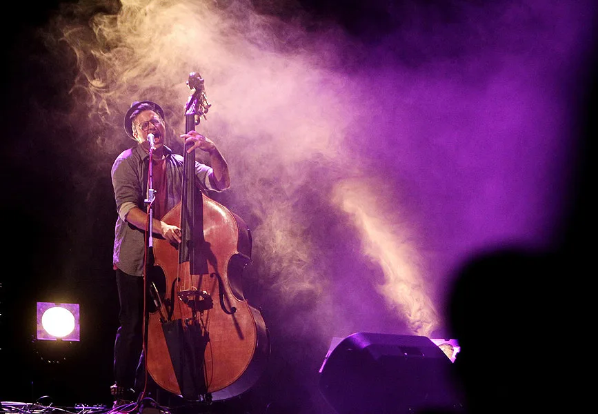 Adam Ben Ezra performing with double bass on stage